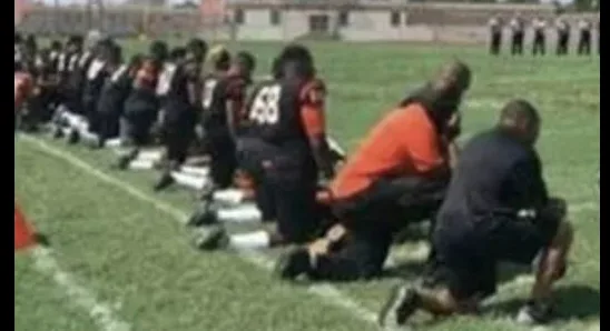 Coach Pays Tribute To Kaepernick During Anthem, Players Join In – Here’s How That Worked Out For Them