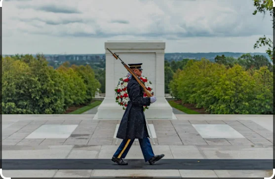 Men laugh at Tomb of the Unknown Soldier memorial, until camera catches soldier setting them straight